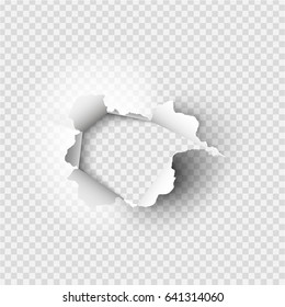 Holes torn in paper on transparent background