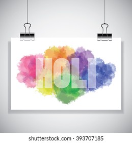 Holi sign on watercolor banner hanging on the wall. Holi festival
