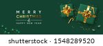 Holiday background Merry Christmas and Happy New Year. Xmas design with realistic festive objects, sparkling lights garland, green gift box, ball bauble, glitter gold confetti. Horizontal banner