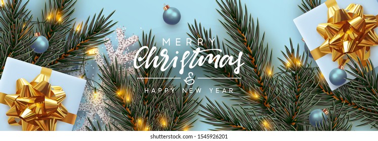 Holiday background Merry Christmas and Happy New Year. Xmas design with realistic festive objects, Pine and spruce branches, sparkling lights garland, gift box, silver snowflake, balls bauble.