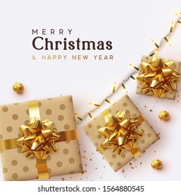 Holiday background Merry Christmas and Happy New Year. Xmas design with realistic festive objects, sparkling lights garland, beige gift box lush bow, glitter gold confetti, round chocolates in foil.