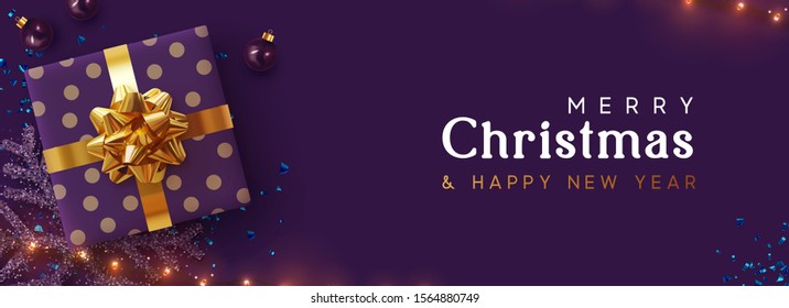 Holiday background Merry Christmas, Happy New Year. Xmas design with realistic festive objects, sparkling lights garland, purple gift box, lilac ball bauble, glitter violet confetti. Horizontal banner