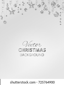 Holiday background with sparkling Christmas glitter ornaments. Silver fiesta border, festive garland with hanging balls and ribbons. Great for New year party posters, headers.