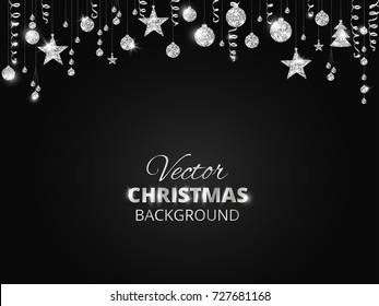 Holiday background with sparkling Christmas glitter ornaments. Silver fiesta border, festive garland with hanging balls and ribbons isolated on white. Great for New year party posters, headers.