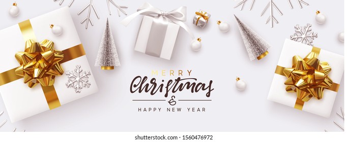 Holiday banner Merry Christmas and Happy New Year. Xmas design white gifts boxes, silver volume snowflake, glass ball. Christmas tree. flat lay, top view. Horizontal festive poster, header for website