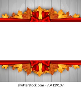 Holiday banner on wooden wall with autumn leaves and red bow. Autumn background. 