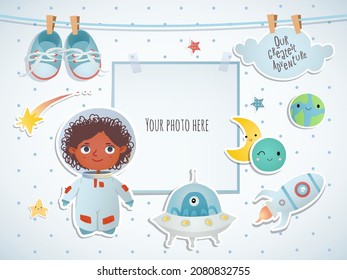 Holiday card design. Baby shower. A little astronaut floating around in open space, among stars, planets,  and comets.