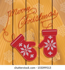 Holiday card design with knitted mittens.