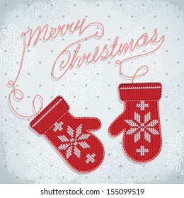 Holiday card design with knitted mittens.