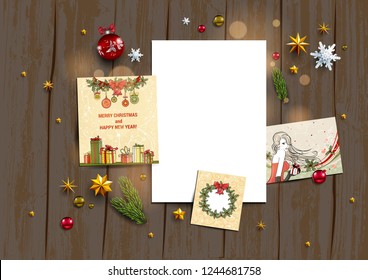 Holiday card with festive card and decorations balls, stars, snowflakes on wood background. Christmas festive template.