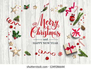 Holiday card with festive card and decorations balls, stars, snowflakes on white wood background. Christmas festive template.