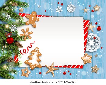 Holiday card with fir tree and festive decorations balls, stars, snowflakes and gingerbreads on wood background. Christmas festive template for banner, ticket, leaflet, card, invitation, poster and so