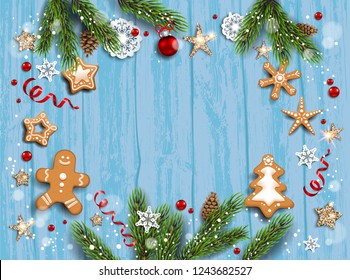 Holiday card with fir tree and festive decorations balls, stars, snowflakes and gingerbreads on wood background. Christmas festive template.