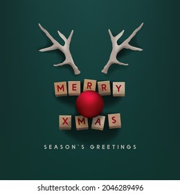 Holiday Christmas greeting card with reindeer face and lettering on green background 