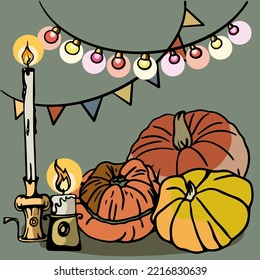 Holiday composition of separate pumpkins, vintage wax candles, holiday flags and colored lights