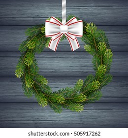 Holiday gift card with Christmas wreath of fir tree branches and bow on wood background. Vector illustration for your design