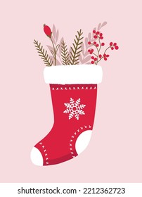Holiday greeting card. Christmas stocking stuffed with floral elements. Festive hand drawn design.