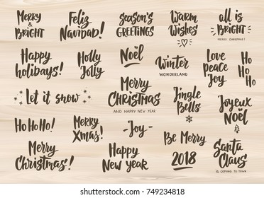 Holiday greeting quotes and wishes. Hand drawn text. Letterings on wooden background. Merry Christmas, Happy New year, Happy Holidays. For cards, gift tags and labels, photo overlays, party posters.