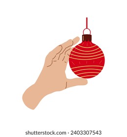 Holiday home decoration hand with Christmas ball Design for banner, web. Ball with stripes. Vector illustration...
