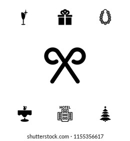 Holiday icon. collection of 7 holiday filled and outline icons such as clean wine glass, candy cane, gift, garland, hotel. editable holiday icons for web and mobile.