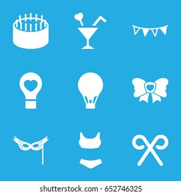 Holiday icons set. set of 9 holiday filled icons such as cake, bulb heart, bow, cocktail, party flag, candy cane, mask, air balloon