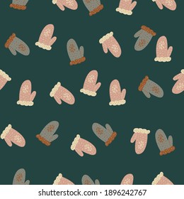 Holiday ornament seamless pattern with pink mittens print. Dark turquoise background. Vector illustration for seasonal textile prints, fabric, banners, backdrops and wallpapers.