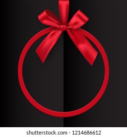Holiday red round frame with bow and ribbon on black opened book background. Vector postcard or greeting card template