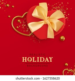 Holiday Romantic Background. Design Realistic decoration objects red gift box, glitter gold confetti, metal heart, ball bead. Template poster, flyer, brochure. Christmas composition flat lay, top view