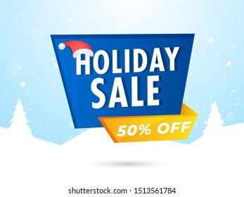 Holiday Sale banner or poster design with santa hat and 50% discount offer on snowy landscape background.