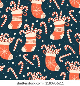 Holiday Seamless Pattern with Christmas Socks and Candy Cane. Xmas winter poster collection