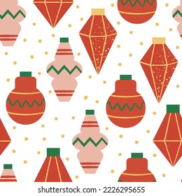 Holiday seamless pattern with red and pink christmas ornaments. Vector background