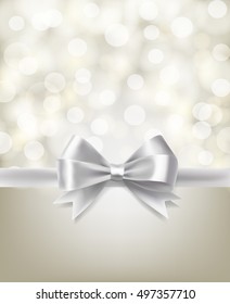 holiday silver bow ribbon and light effects blurry background. vector design template