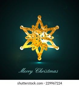 Holiday vector illustration of a golden metallic foil snowflake on the dark background with sparkles. Merry Christmas and Happy New Year. Postcard, flyer or greeting card design