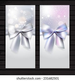 Holiday vertical banner with silver bow and ribbon; winter vector flyer template with snowflakes  and snow