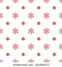 Holiday winter seamless pattern with many red snowflakes on white backdrop. Endless repeating pattern for printing on package, wrapper, fabric, envelope, card or gift paper for Christmas and New Year.