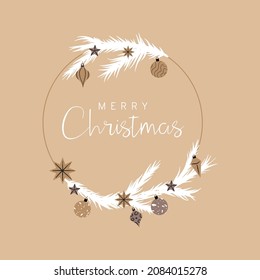 Holiday wreath with various ornaments and flocked tree branches