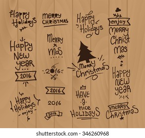 Holidays lettering set. Hand drawn design compositions on wooden background.