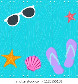 Holidays in summer, glasses of shells on a blue board with plumbing.