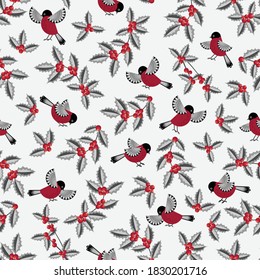 Holly leaves and winter birds seamless pattern