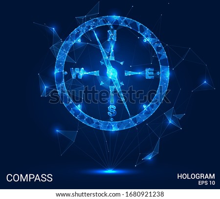 A hologram compass. A compass of polygons, triangles , points, and lines. Compass is a low-poly compound structure. The technology concept.