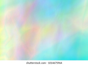Holographic Foil. Beautiful magic background. Colorful wallpaper
