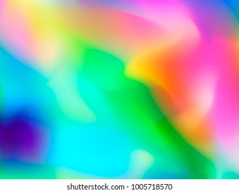 holographic rainbow foil abstract background. colorful bright blurry backdrop