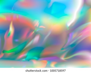 holographic rainbow foil abstract background. colorful bright blurry backdrop