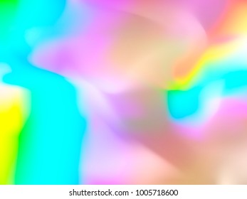 holographic rainbow foil abstract background. colorful bright blurry backdrop