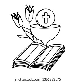 holy bible with chalice and flowers