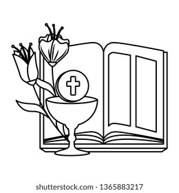 holy bible with chalice and flowers