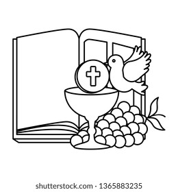 holy bible with chalice and grapes