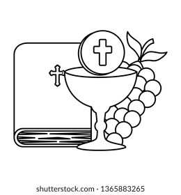 holy bible with chalice and grapes