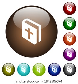 Holy bible white icons on round glass buttons in multiple colors