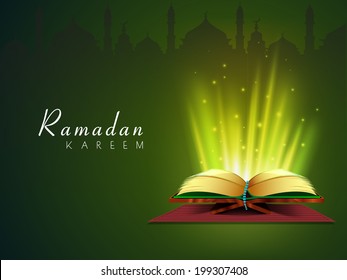 Holy illumination coming out from Islamic religious book Quran Shareef on green background for Ramadan Kareem. 